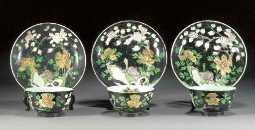 Three famille noire tea bowls and saucers
Kangxi