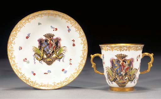 A Meissen armorial two-handled beaker and saucer from the Albani-Borromeo Service