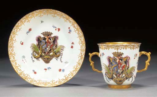 A Meissen armorial two-handled beaker and saucer from the Albani-Borromeo Service