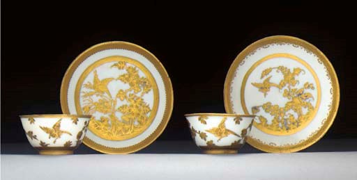 A Meissen teabowl and saucer and a Meissen teabowl and a saucer