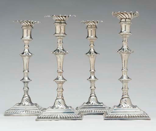 A SET OF FOUR GEORGE III SILVER CANDLESTICKS,