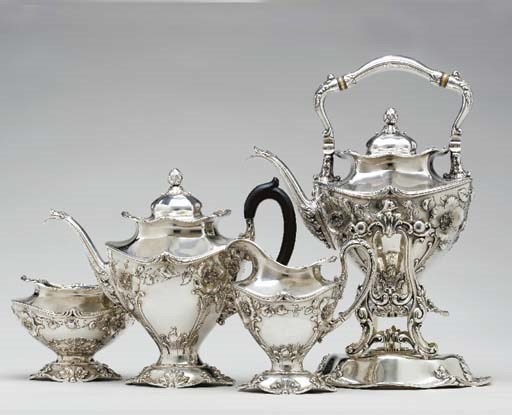 AN AMERICAN SILVER FOUR-PIECE TEA SERVICE,