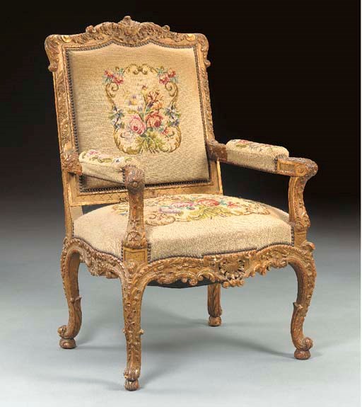 A LOUIS XV STYLE GILTWOOD FAUTEUIL,