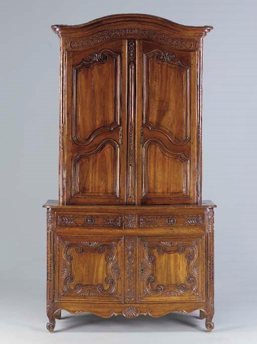 A LOUIS XV PROVINCIAL WALNUT AND OAK BUFFET A DEUX CORPS,