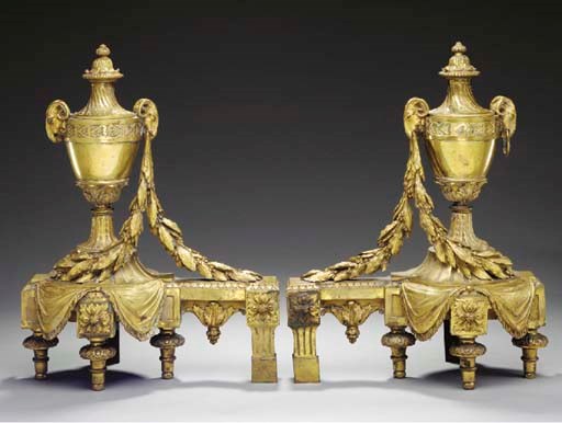A PAIR OF LOUIS XVI STYLE ORMOLU CHENETS,