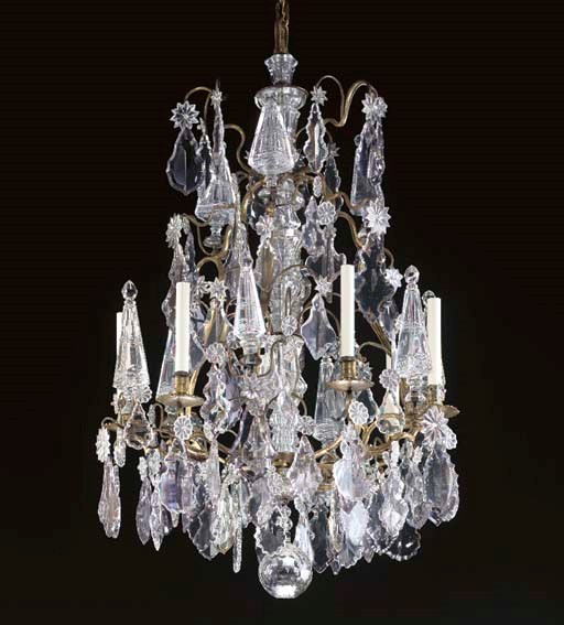 A GILT-METAL AND CUT-GLASS SIX-LIGHT CHANDELIER,
