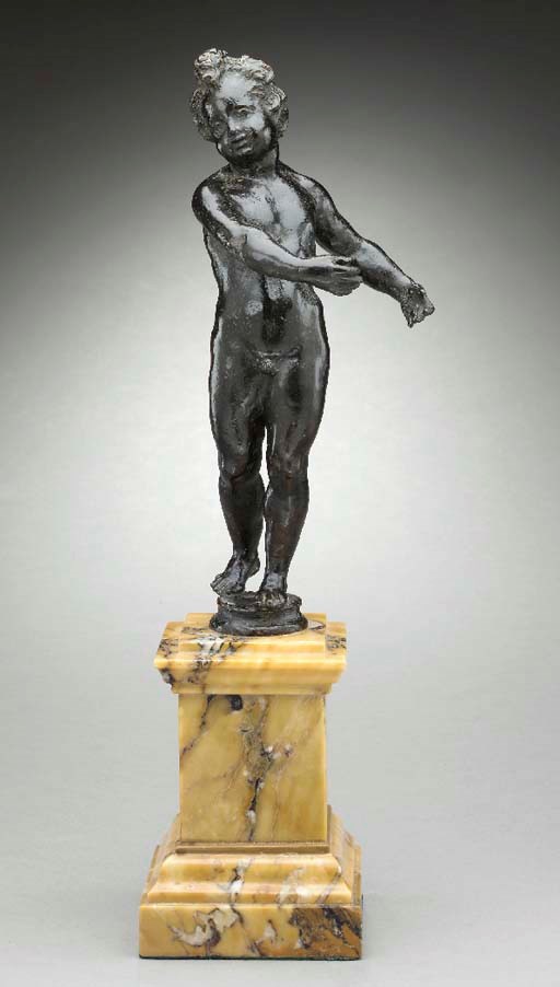 AN ITALIAN PATINATED BRONZE FIGURE OF A PUTTO,