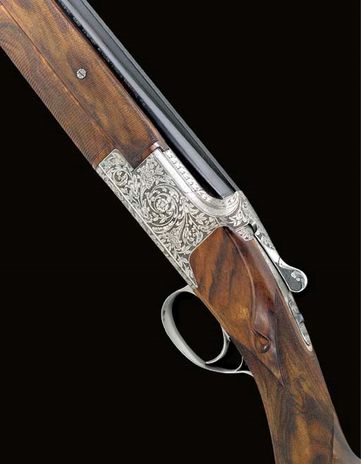 A FINE BROWNING 9.3 X 74(R) MM SINGLE-TRIGGER OVER-AND-UNDER EJECTOR RIFLE BY F.N., NO. 1637