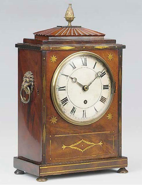 A George IV mahogany and brass-inlaid bracket timepiece, circa 1830