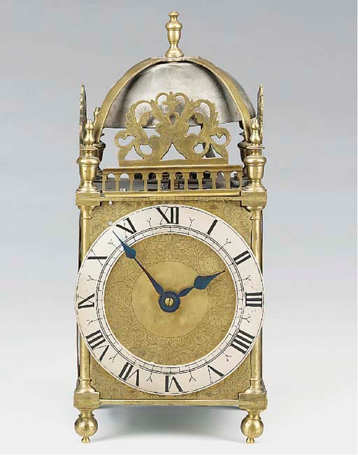 A Charles II brass striking lantern clock, dated 1665