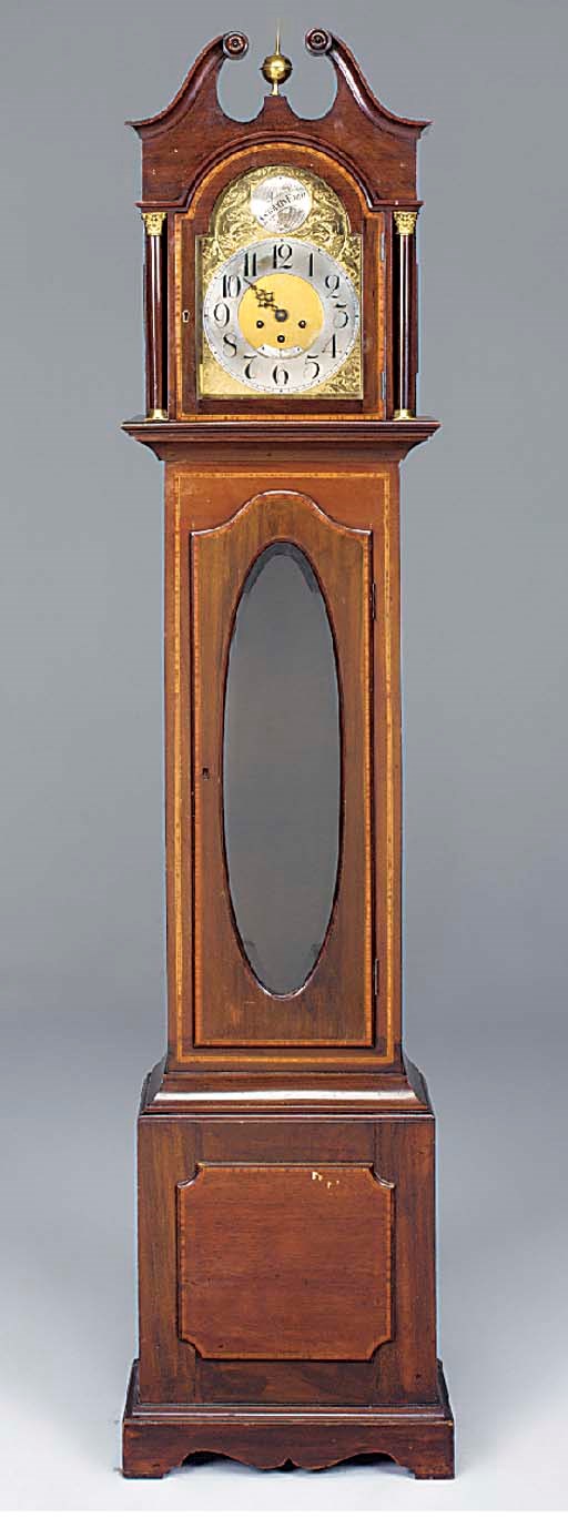 A German mahogany and satinwood inlaid quarter-chiming longcase clock, first half 20th century