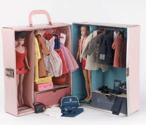 A Barbie and Ken pink trunk