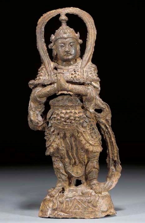 A CHINESE IRON MODEL OF A WARRIOR
YUAN DYNASTY