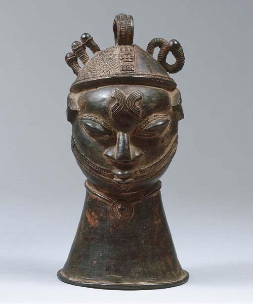 A FINE YORUBA BRASS BELL-HEAD