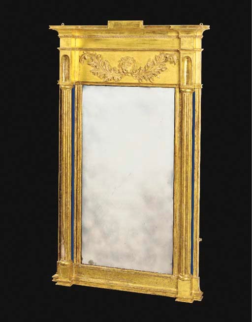 AN IRISH REGENCY GILTWOOD PIER GLASS