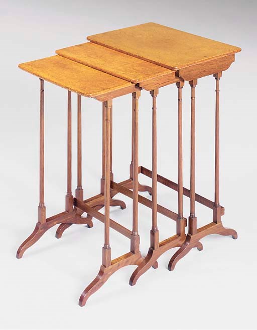 A SET OF THREE REGENCY AMBOYNA AND PARTRIDGEWOOD QUARTETTO TABLES