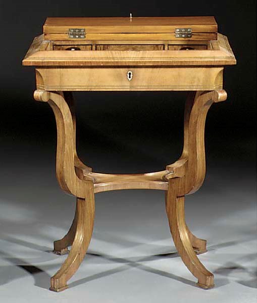 A North European brass-inlaid mahogany work table