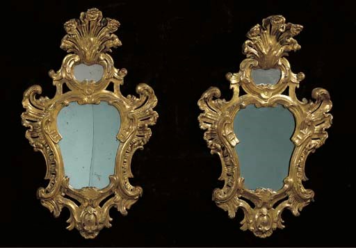 A pair of North Italian giltwood girandoles