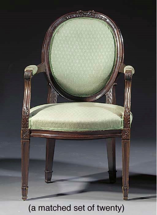 A matched set of twenty Dutch mahogany and stained wood dining-chairs