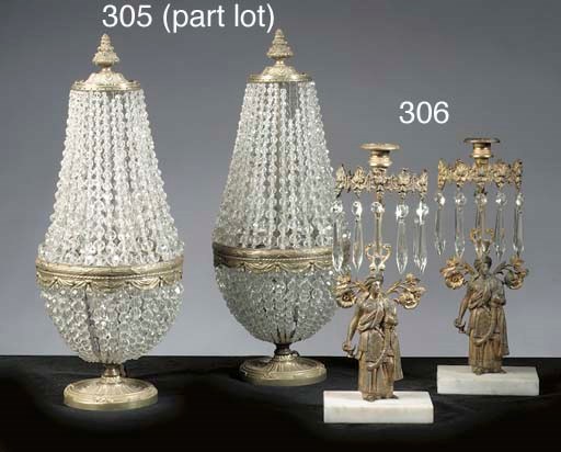 A pair of brass and simulated cut-glass lamps