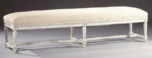 A white-painted settee