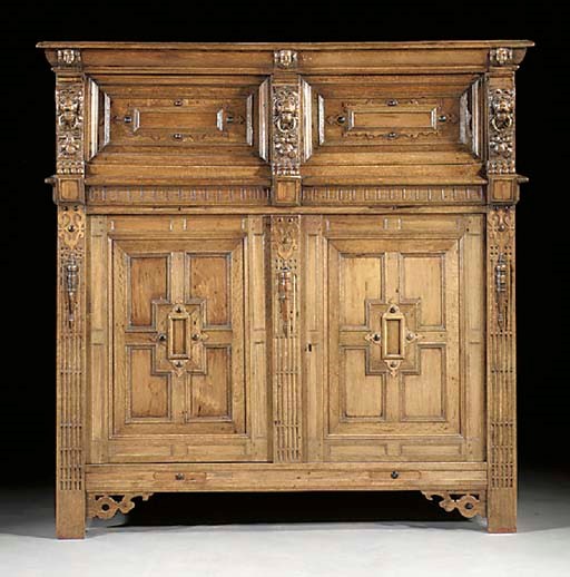 A Flemish oak and walnut cupboard