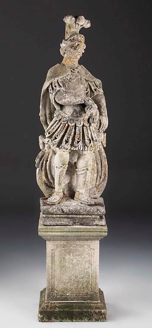 A carved limestone figure of a soldier
