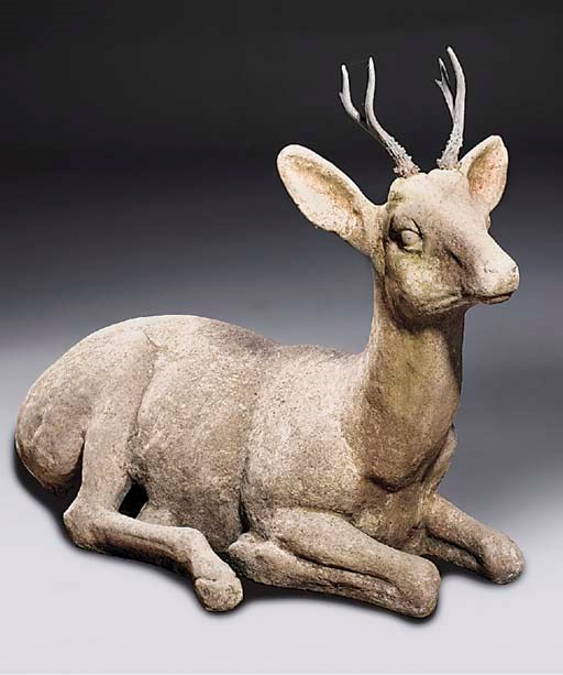 A composite figure of a reclining deer