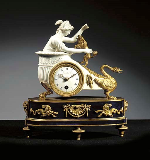 A French ormolu-mounted biscuit mantel timepiece