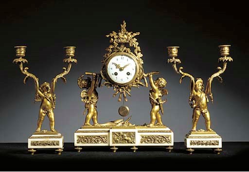 A French gilt-metal white marble garniture de cheminee
