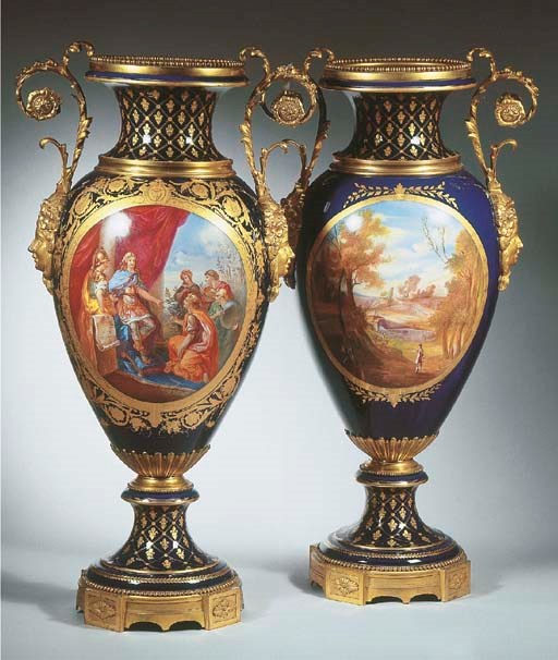 A pair of very large Sèvres-style porcelain polychrome twohandled gilt metal-mounted presentation vases