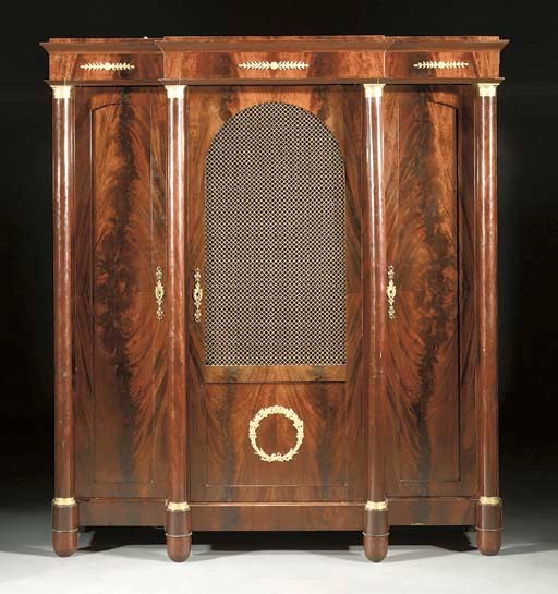 A French ormolu-mounted and mahogany breakfront bookcase
