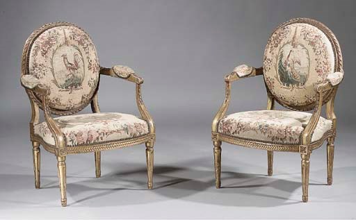 A pair of Louis XVI carved giltwood fauteuils