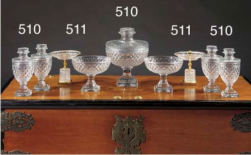A Baccarat-style cut-glass seven piece garniture