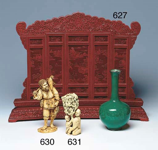 A CHINESE CINNABAR LACQUER TABLE SCREEN