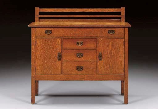 AN OAK SIDEBOARD