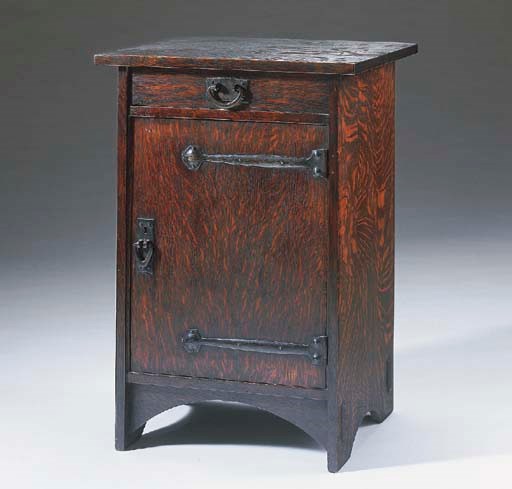 AN OAK SMOKING CABINET