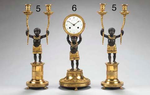 A PAIR OF CHARLES X PATINATED-BRONZE AND ORMOLU TWO-LIGHT CANDELABRA,