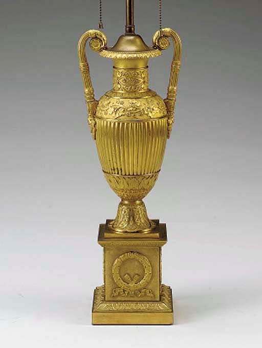 A CHARLES X ORMOLU URN MOUNTED AS A TABLE LAMP,