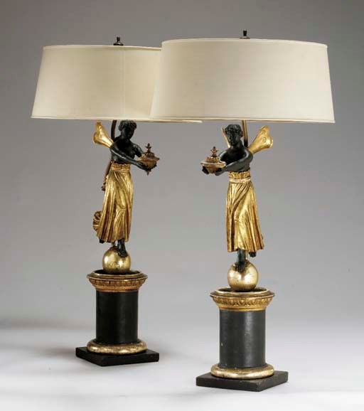 A PAIR OF AUSTRIAN NEOCLASSIC PARCEL-GILT, SILVERED AND EBONIZED TABLE LAMPS,