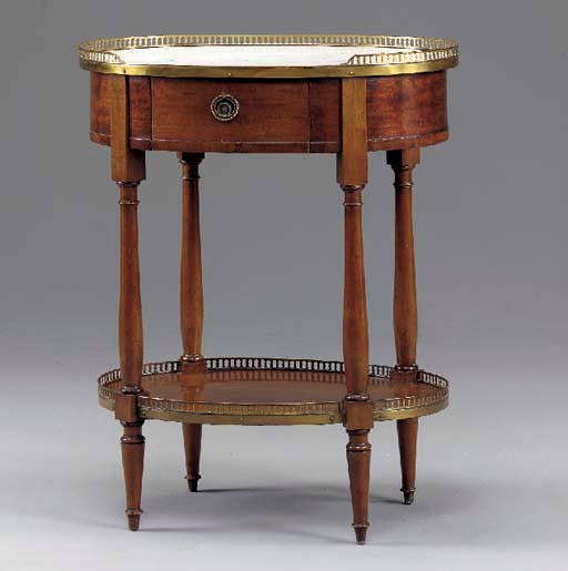 A LOUIS XVI STYLE ORMOLU-MOUNTED MAHOGANY GUERIDON,