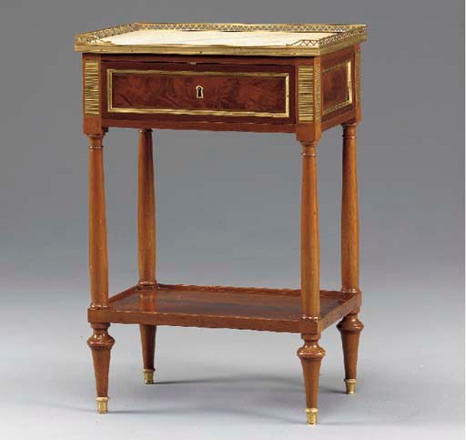 A LOUIS XVI ORMOLU-MOUNTED MAHOGANY TABLE A ECRIRE,
