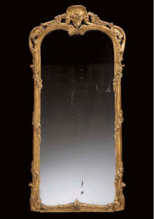 A LOUIS XV GILTWOOD MIRROR,