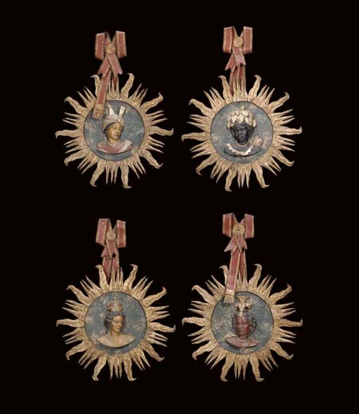 A SET OF FOUR ITALIAN POLYCHROMED AND SILVERED-TOLE PLAQUES OF THE CONTINENTS,