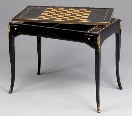 A LOUIS XV ORMOLU-MOUNTED EBONIZED TRIC-TRAC TABLE,