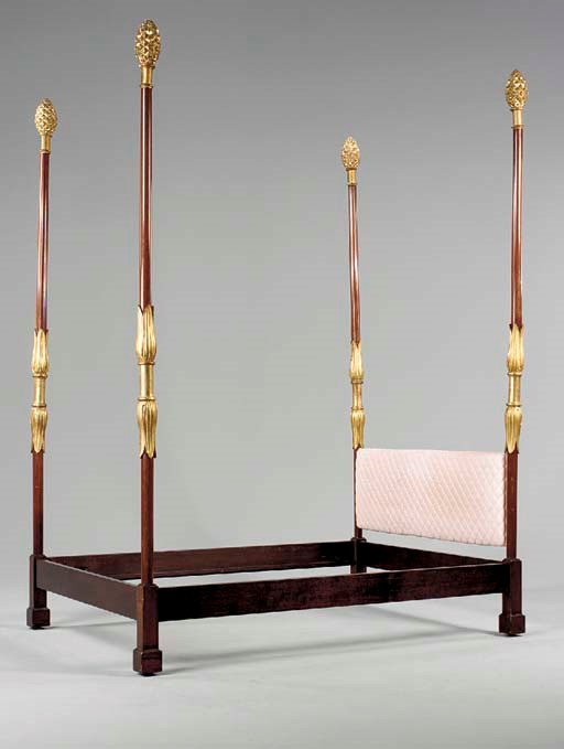 AN ITALIAN NEOCLASSIC STYLE PARCEL-GILT MAHOGANY FOUR-POST BED,