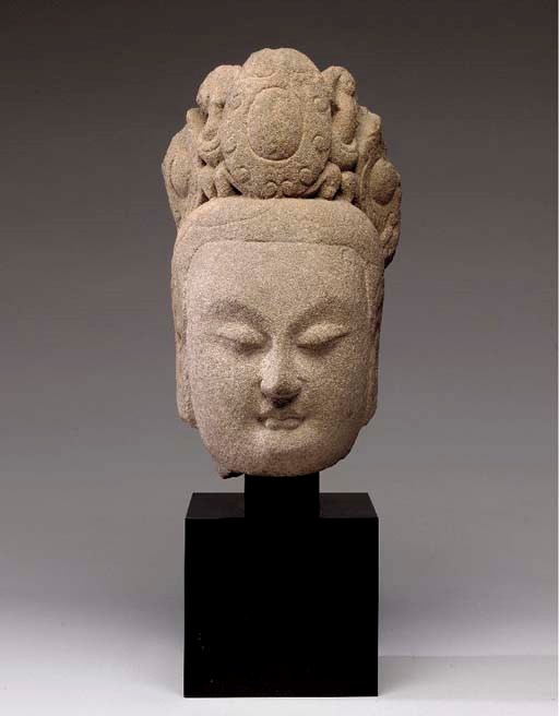 A LIMESTONE HEAD OF A BODHISSATVA,