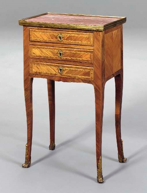 A LOUIS XV/XVI KINGWOOD, TULIPWOOD AND PARQUETRY TABLE EN CHIFFONIERE,