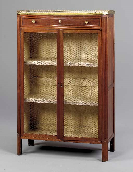 A LOUIS XVI BRASS-MOUNTED MAHOGANY BIBLIOTHEQUE,
