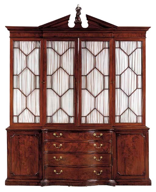 A GEORGE III MAHOGANY BREAKFRONT-BOOKCASE,